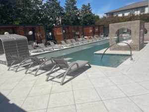 Sculptural cabanas and loungers define this upscale pool deck with modern elegance